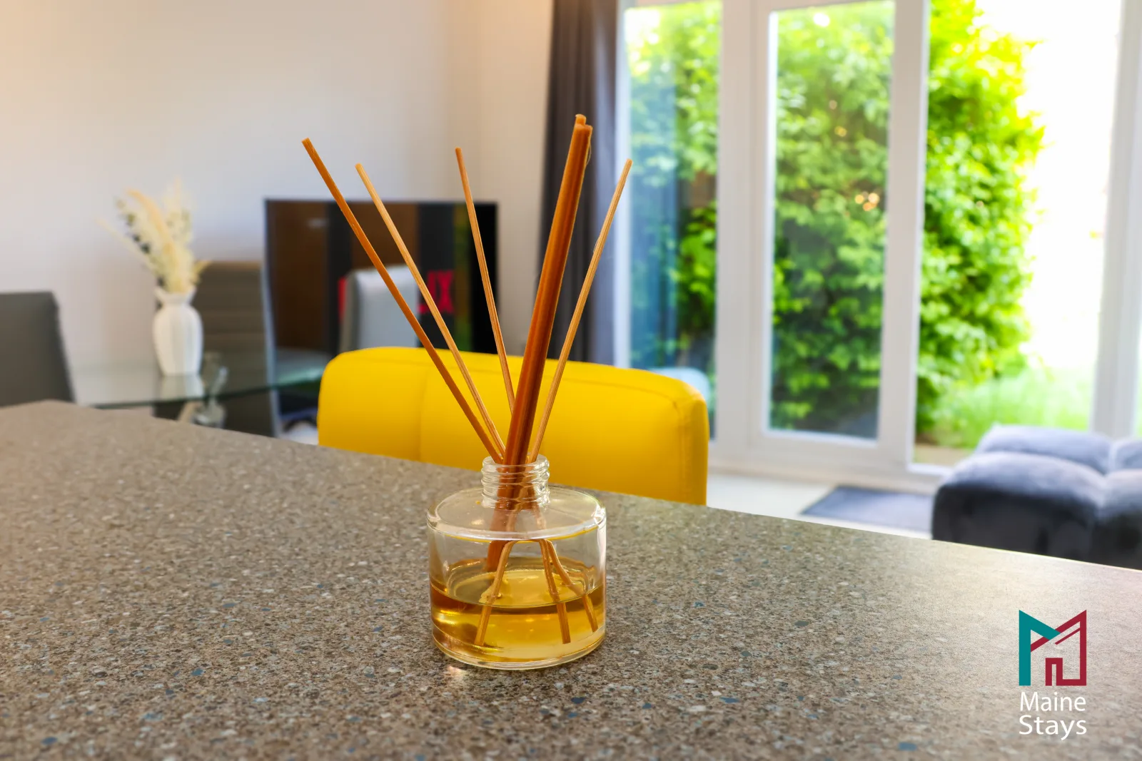 Humber Hub Coventry - Open-plan kitchen, dining and lounge: reed diffuser garden view b