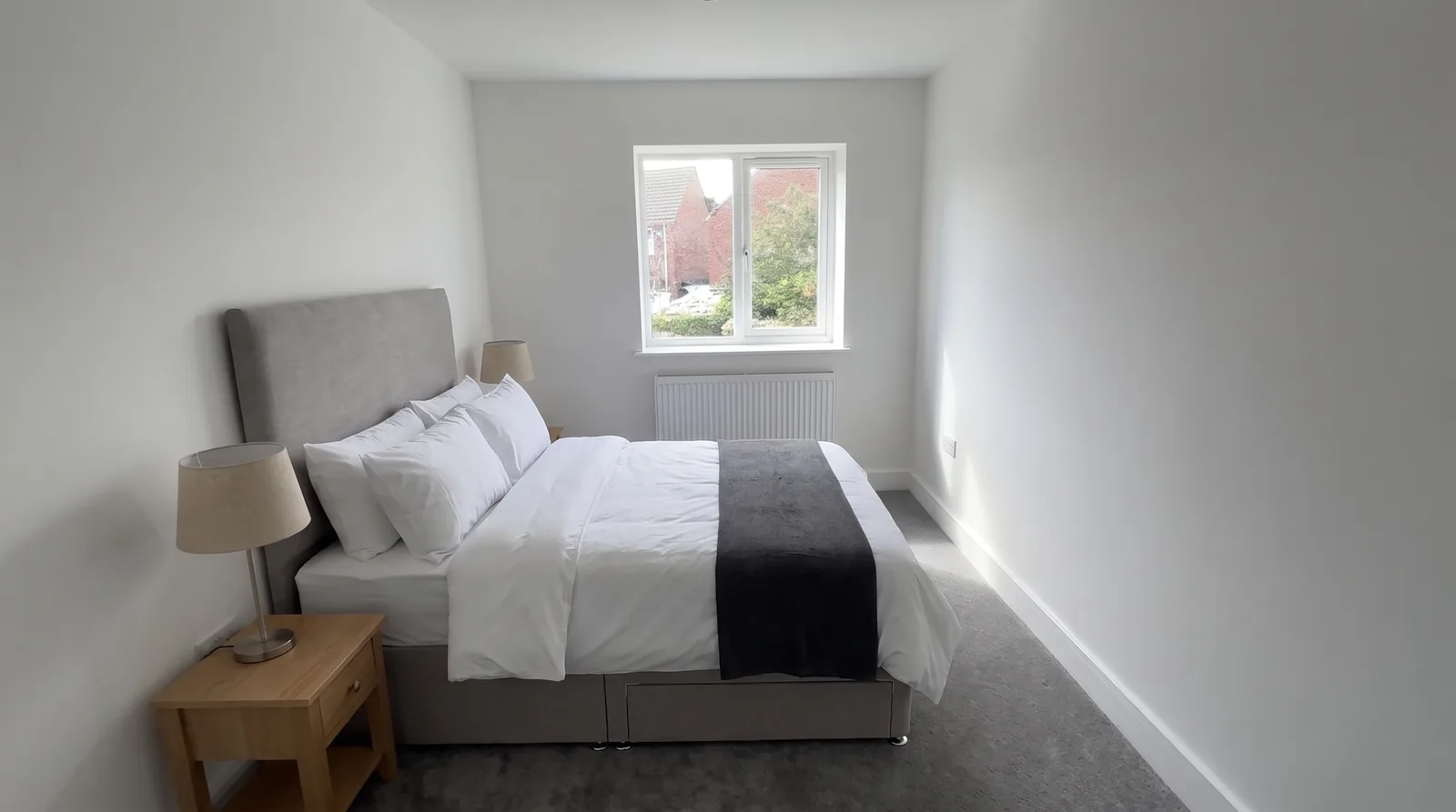 Stoke House — Second bedroom with a king-size bed (illustrative furnishing)