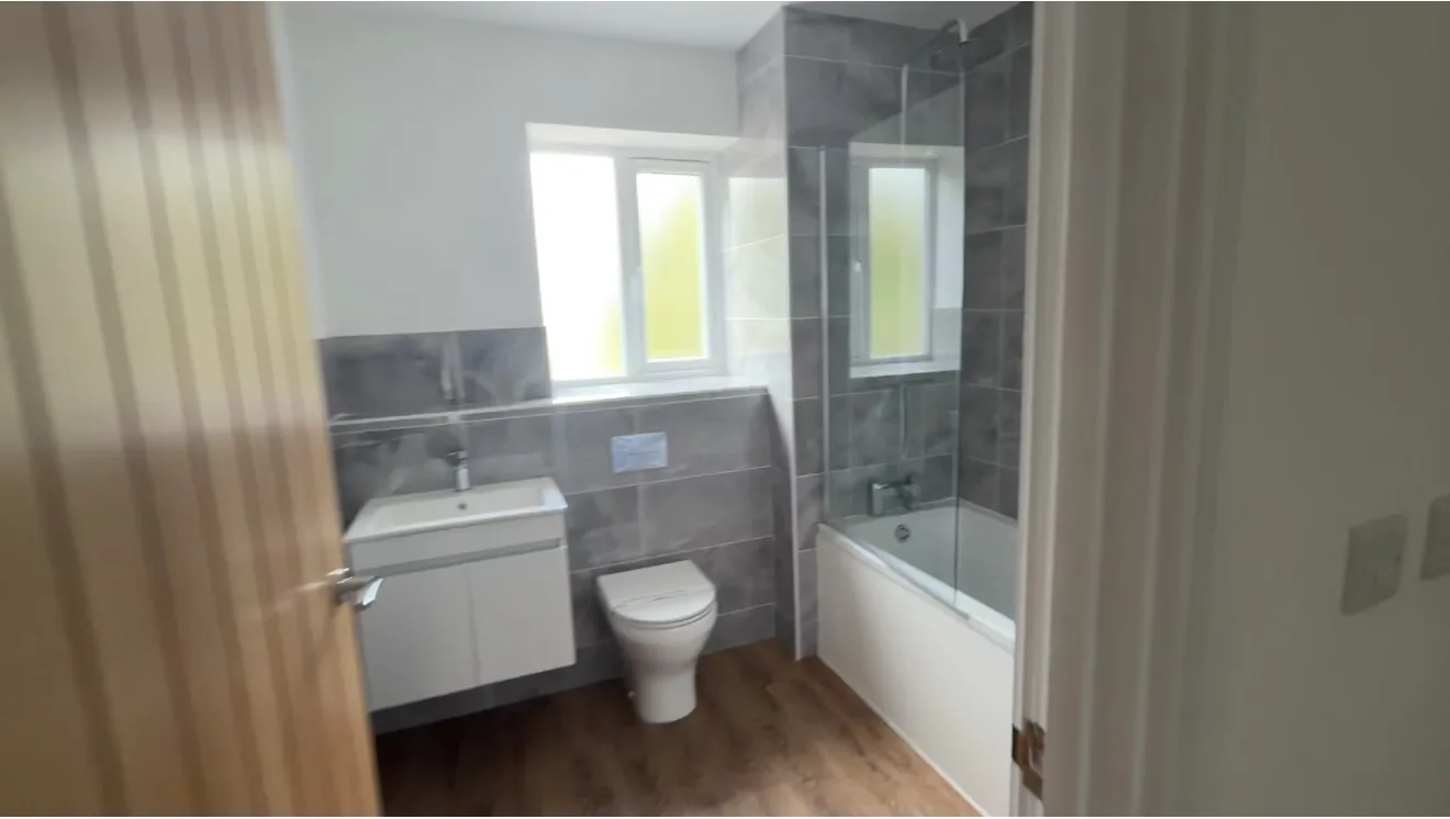 Stoke House — Family bathroom, the bath and basin