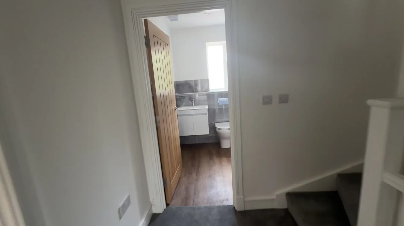Stoke House — Landing with the family bathroom beyond