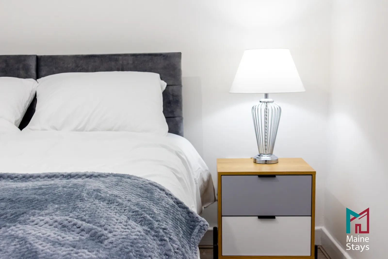 The Dudley Lounge — Bedside drawers and table lamp
