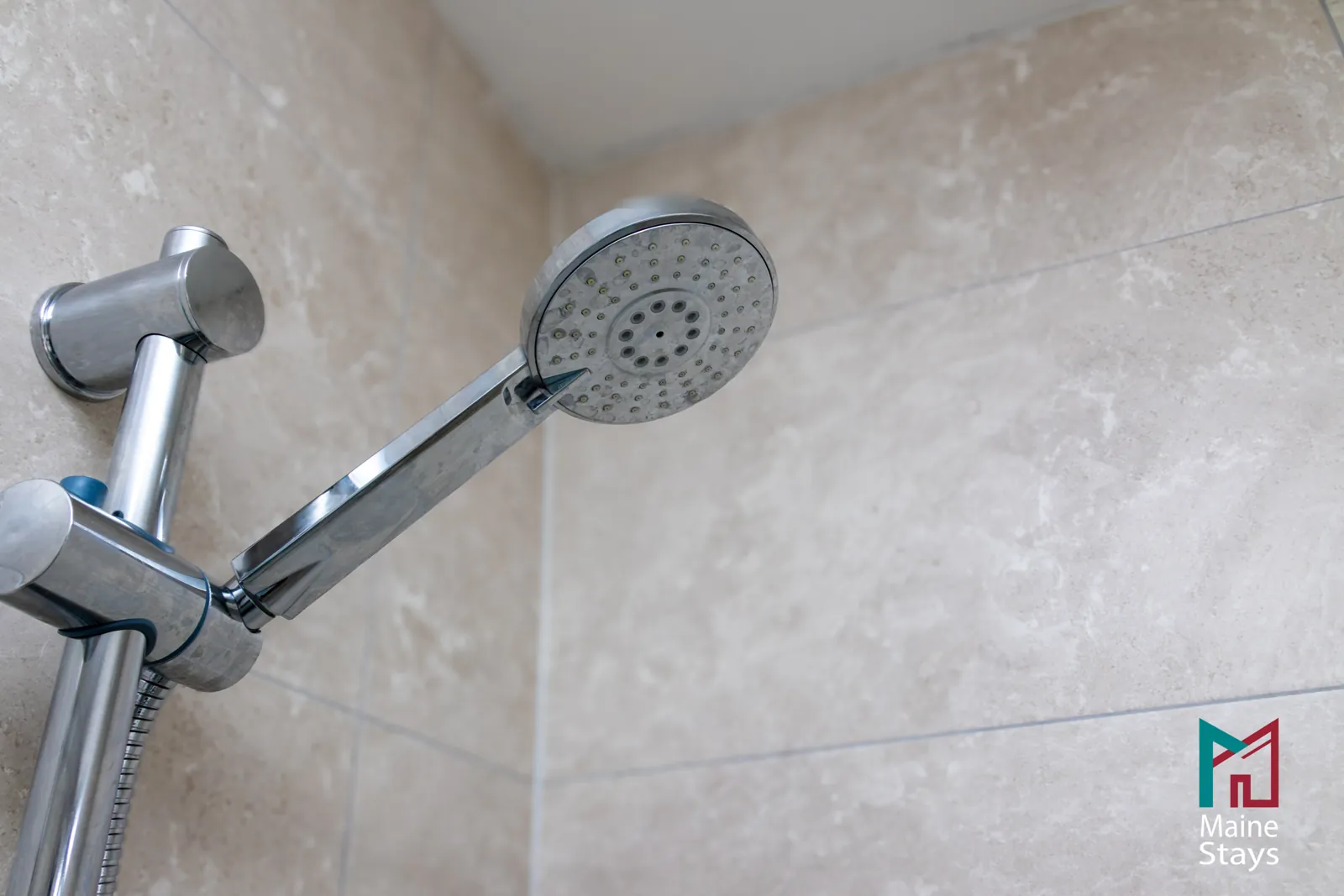 The Dudley Lounge — Shower in the tiled bathroom